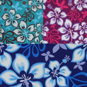 Ein Muster aus verschiedenen blauen, pinken und türkisen floralen Designs.